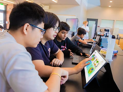Students collaborating with bright ViewSonic portable displays